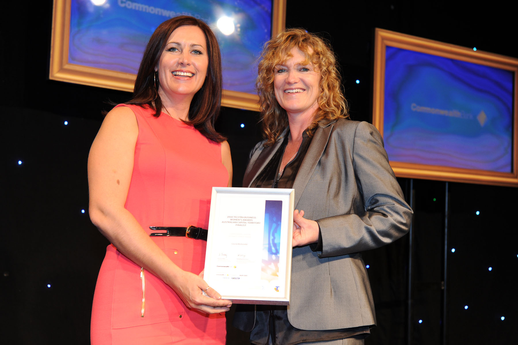 Photo of Laurie McDonald accepting Finalist's Certificate